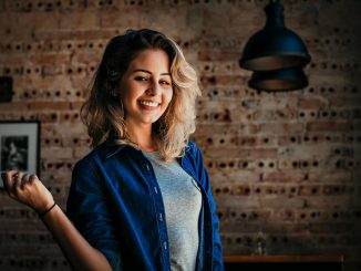 Woman Wearing Blue Button-up Jacket