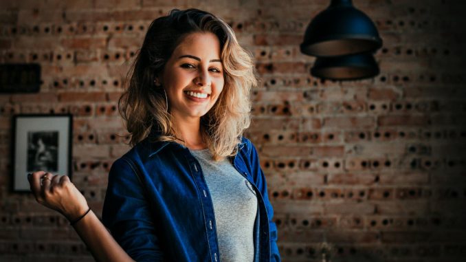 Woman Wearing Blue Button-up Jacket