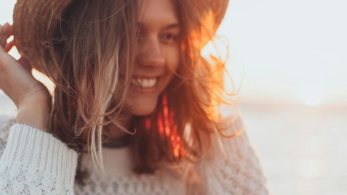 Selective Focus Photo of Woman Wearing White Sweater